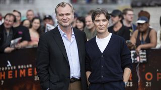 Director Christopher Nolan (left) and Cillian Murphy (right) pose for the film 'Oppenheimer' in London (12 July 2023)