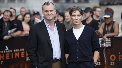 Director Christopher Nolan (left) and Cillian Murphy (right) pose for the film 'Oppenheimer' in London (12 July 2023)