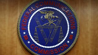 The seal of the Federal Communications Commission (FCC) is seen before an FCC meeting in Washington. 