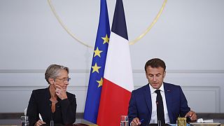 الرئيس الفرنسي رفقة رئيسة الحكومة