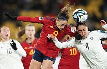 Spain's Esther Gonzalez, left, and Costa Rica's Mariana Benavides compete to head for the ball during the Women's World Cup Group C match.