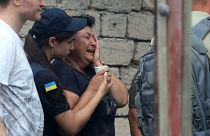 Мать погибшего в результате обстрела 21-летнего охранника административного здания, Одесса, 20 июля 2023 года.