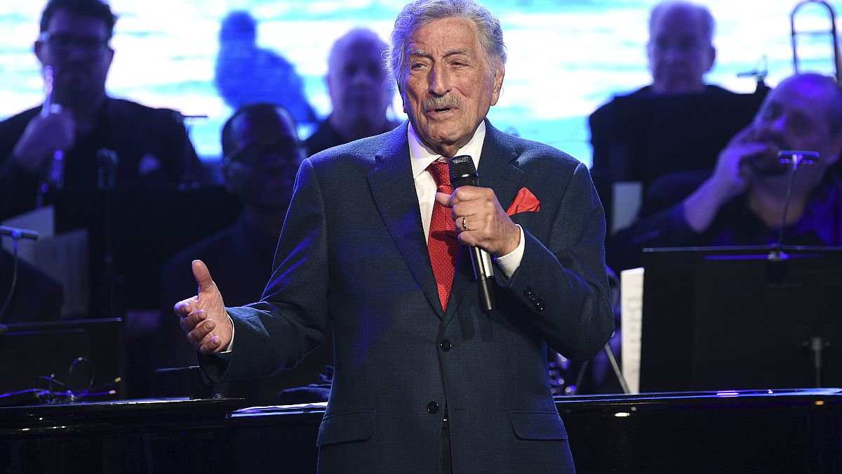 FILE - Tony Bennett performs at the Statue of Liberty Museum opening celebration on May 15, 2019, in New York