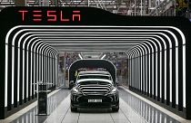 An electric vehicle of the model Y is pictured during the start of the production at Tesla's "Gigafactory" on March 22, 2022 in Gruenheide, southeast of Berlin.