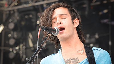 Matty Healy, lead singer of The 1975, performs at The Governors Ball Music Festival at Randall's Island Park on June 6, 2014 in New York