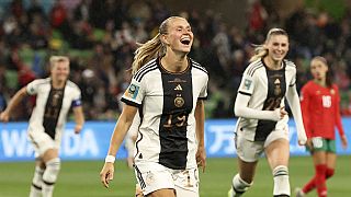 Germany's Klara Buehl celebrates after scoring her side's third goal during the Women's World Cup Group H soccer match between Germany and Morocco in Melbourne, Australia.
