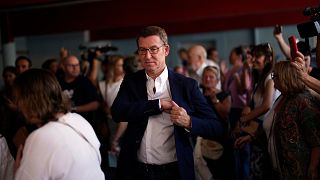 Popular Party leader Alberto Nunez Feijoo leaves a polling station after voting in Madrid