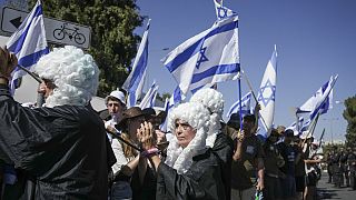 Israelis protest against Prime Minister Benjamin Netanyahu's judicial overhaul plan, outside the parliament in Jerusalem, Monday, July 24, 2023. 