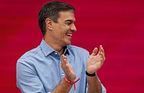 Socialist Workers' Party leader and current Prime Minister Pedro Sanchez applauds during an executive committee meeting in Madrid.