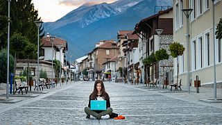 Digital nomads travel from location to location working remotely using technology and the internet. 