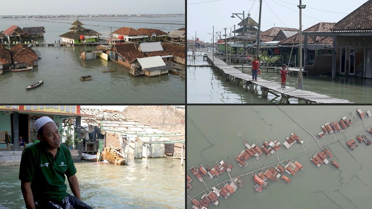 In Timbulsloko, many buildings including the town’s mosque are already submerged beneath the water. 