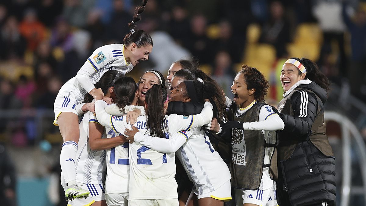 The Philippines celebrate their victory following the Women's World Cup Group A soccer match between New Zealand and Philippines in Wellington, New Zealand, Tuesday, July 25