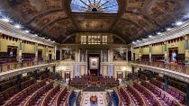 FILE - Empty seats inside Spanish parliament's lower house in Madrid, Spain, July 2023