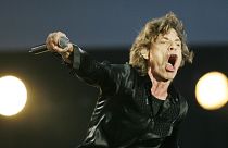 Mick Jagger performs during the Rolling Stones concert at the San Siro stadium in Milan, Italy, Tuesday, July 11, 2006.