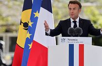 French President Emmanuel Macron delivers his speech at the Place des Cocotiers in Noumea on July 26, 2023.