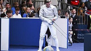 Ukraine's Olga Kharlan leaves after her bout with Russia's Anna Smirnova during the FIE World Fencing Championship, in Milan, Italy, Thursday, July 27, 2023.
