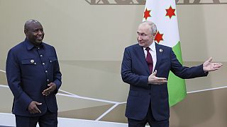 Russian President Vladimir Putin, right, and President of the Republic of Burundi Evariste Ndayishimiye meet on the sidelines of the Russia Africa Summit in St. Petersburg.