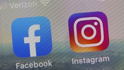 This photo shows the mobile phone app logos for, from left, Facebook and Instagram