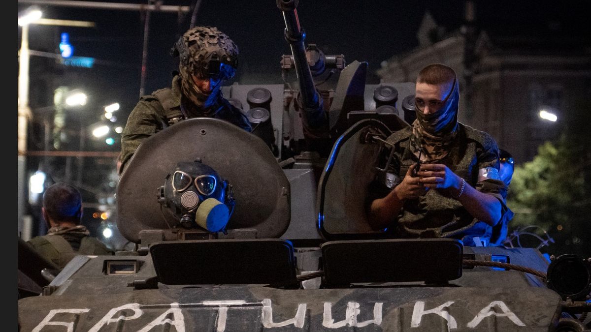 Members of Wagner group looks from a military vehicle with the sign read as "Brother" in Rostov-on-Don late on June 24, 2023.