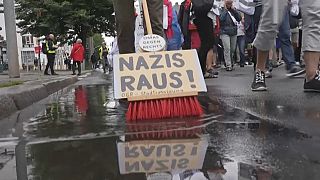 "Nazis get out" sign.