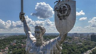 Motherland Monument as steeplejacks dismantle the coat of arms of the former Soviet Union from the shield of a 62-meter (102 meters with pedestal) Motherland Monument in Kyiv