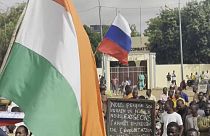 A Russian flag being brandished at the the rally in Niamey.