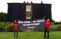 Greenpeace activists at British premier's private house