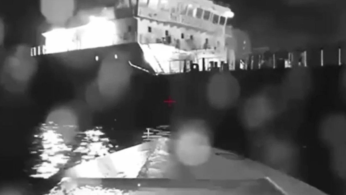 In this image from video made available on Saturday, Aug. 5, 2023, a seaborne drone approaches a Russian tanker on the Black Sea.
