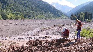 Millions of tonnes of mud swept down the riverbed destroying houses, bridges and roads.