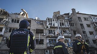 Ukrainian Emergency Service, rescuers work on the scene of a building damaged after Russian missile strikes in Pokrovsk, Donetsk region, Ukraine, Tuesday, Aug. 8, 2023. 