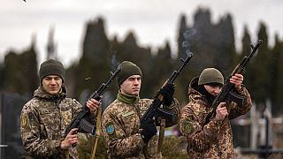 Ukrainian soldiers fire salvoes during a funeral in Bila Tserkva, near Kyiv, Ukraine.