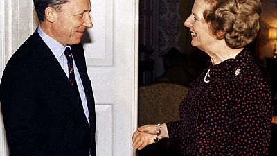 1984 file photo, Britain's Prime Minister Margaret Thatcher greets France's Jacques Delors, the then president-elect of the European Commission, inside 10 Downing Street.