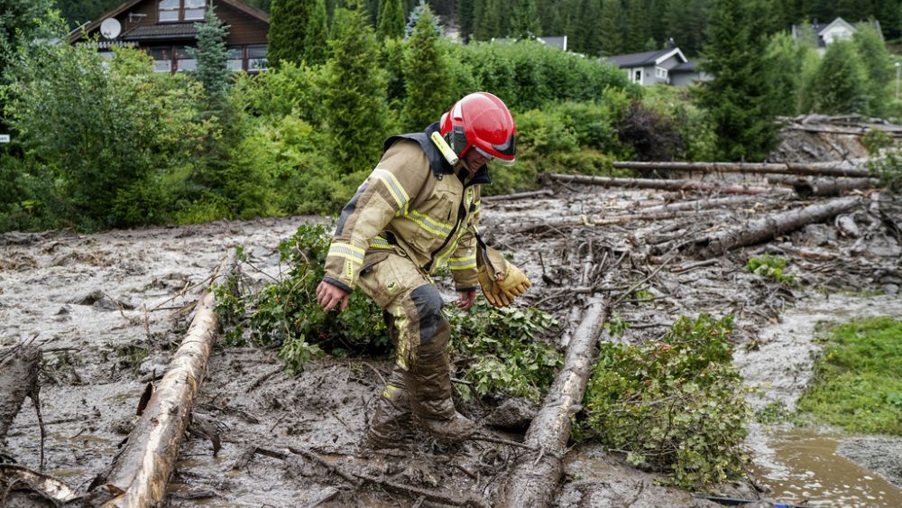 Watch: Storm Hans washes away roads and floods homes in Norway and Sweden thumbnail
