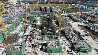نمایی هوایی از پروژه توسعه مسکن جدید اورگراند در پکن در حال ساخت، چهارشنبه، ۲۲ سپتامبر ۲۰۲۱.