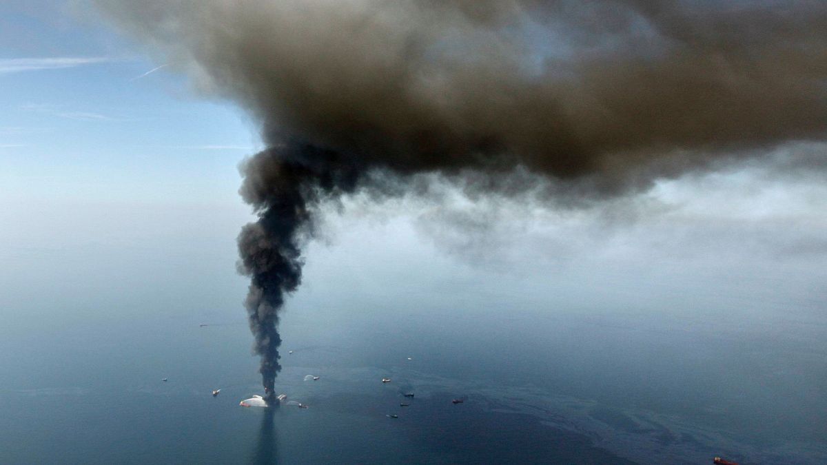 In this April 21, 2010, file photo, the Deepwater Horizon oil rig burns in the Gulf of Mexico. 