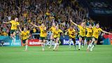 Australia players celebrate after winning the Women's World Cup quarterfinal