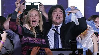 Javier Milei, presidential candidate of the Liberty Advances coalition, embraces his sister Karina after polling stations closed during primary elections.