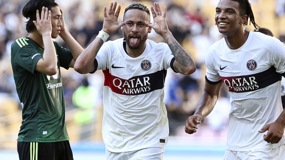 PSG's Neymar, center, celebrates after scoring the first goal during a friendly soccer match against Jeonbuk Hyundai Motors in Busan, South Korea, Thursday, Aug. 3, 2023. 