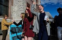 Youth plaintiffs in the climate change lawsuit, Held vs. Montana, arrive at the courthouse, on 20 June 2023, in Helena, Montana, for the final day of the trial.