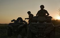 Ukrainian soldiers ride all-terrain vehicles at the front line near Bakhmut, one of the longest battles with Russian troops, Ukraine, Monday, Aug. 14, 2023.