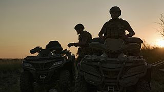 Ukrainian soldiers ride all-terrain vehicles at the front line near Bakhmut, one of the longest battles with Russian troops, Ukraine, Monday, Aug. 14, 2023. 
