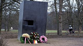 Wreaths have been laid in front of the Memorial to Homosexuals Persecuted Under Nazism in Berlin.