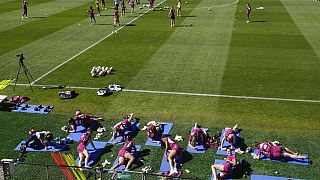Spanish players stretch during a team training session in Sydney Thursday, Aug. 17, 2023 ahead of the Women's World Cup final against England here on Sunday Aug.20.