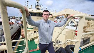 Daragh McGuinness, a deck hand on the Atlantic Challenger, on the fishing vessel moored in the harbour in Killybegs, western Ireland.