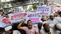 Muslim protestors shout slogans against the burning of the Quran in Sweden, outside the Baitul Muqarram Mosque in Dhaka, Bangladesh, Friday, July 7, 2023