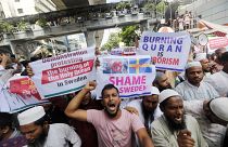 Muslim protestors shout slogans against the burning of the Quran in Sweden, outside the Baitul Muqarram Mosque in Dhaka, Bangladesh, Friday, July 7, 2023