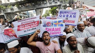 Muslim protestors shout slogans against the burning of the Quran in Sweden, outside the Baitul Muqarram Mosque in Dhaka, Bangladesh, Friday, July 7, 2023.