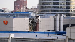 This photo shows damaged on an Expocentre building following a drone attack in Moscow on August 18, 2023