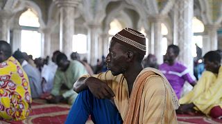 A man prays in a Mosque in Fass Boye.