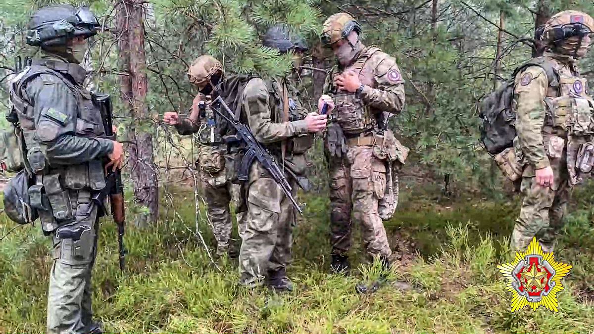 A photo taken from video released by Belarus' Defence Ministry shows Belarusian troops training with Wagner mercenaries.